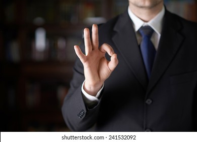 Close-up Fragment Of A Man In A Business Suit Showing An Ok Sign Gesture, Shallow Depth Of Field Composition