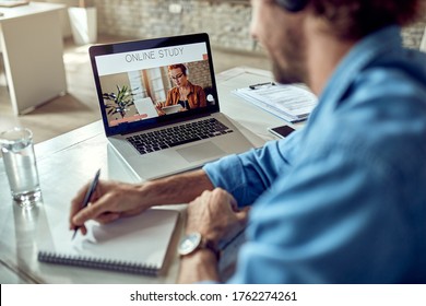 Close-up of freelancer learning online while using laptop in the office.  - Shutterstock ID 1762274261