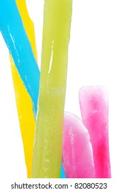 Closeup Freezer Pops Of Different Colors On A White Background