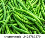 Close-up of fresh green beans with a vibrant color and smooth texture