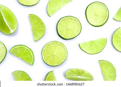 Closeup fresh lime slices isolated on white background. Top view. Flat lay.