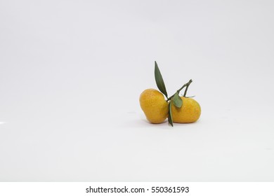 Closeup of fresh oranges. Isolated on white background - Shutterstock ID 550361593