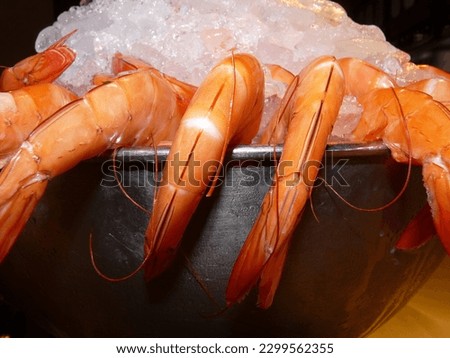 Close-up of fresh prawns in a bucket of ice, Mercado de San Miguel, Madrid, Spain