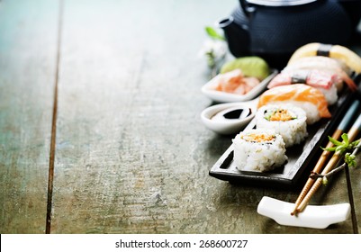 Closeup of fresh sushi  on rustic wooden table - Powered by Shutterstock