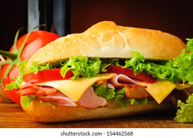 Closeup Of Fresh Traditional Deli Sub Sandwich And Ingredients