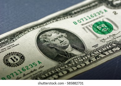Closeup of the front of a two dollar bill.