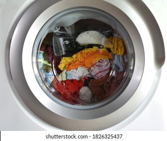A close-up of the front-loading washing machine for presentation.