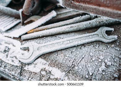 Closeup Of Frosted Adjustable Wrenches. Left Outside Tools In Winter. Cold, Early Frosts, Hoar Concept