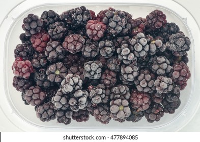 Closeup To Frozen Blackberries In Plastic Box