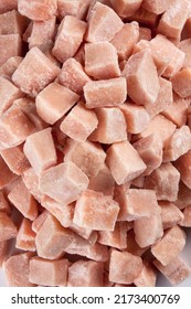 Close-up Of Frozen Chicken Meat Cubes.