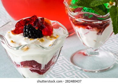 Closeup Of Fruit Parfait With Greek Yogurt And Mint And Strawberry  Jello.