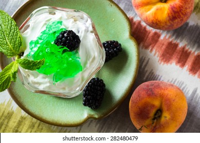 Closeup Of Fruit Parfait With Greek Yogurt And Mint Jello.