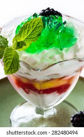 Closeup Of Fruit Parfait With Greek Yogurt And Mint Jello.