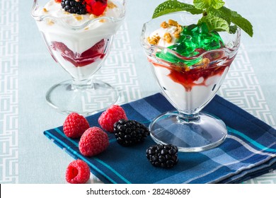 Closeup Of Fruit Parfait With Greek Yogurt And Mint And Strawberry Jello.