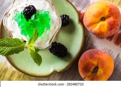 Closeup Of Fruit Parfait With Greek Yogurt And Mint Jello.