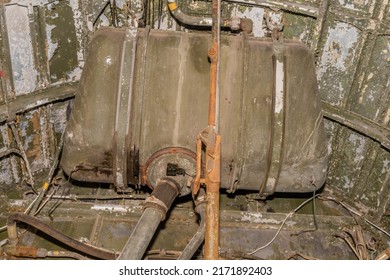 Closeup Of Fuel Tank Under Wing In Wheel Well Of Large Aircraft.