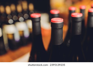 Closeup of full corked bottles of wine - Shutterstock ID 2395139235