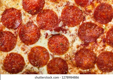 Close-up full frame shot of delicious pepperoni pizza. Delicious italian fast food. Top view - Powered by Shutterstock