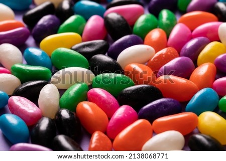 Close-up full frame shot of multi colored candies. unaltered, sweet food and unhealthy eating concept.