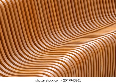 close-up full frame view of curved parametric plywood public bench at daylight - Shutterstock ID 2047943261