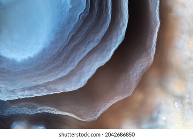 Close-up full-screen texture - fragment of blue layered agate.