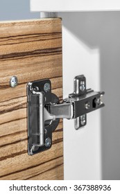 Closeup Of Furniture Cabinet Modern Clip Hinge With Amortization - Kitchen Slow Motion Hardware