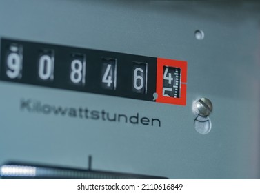 Close-up gauge. Electricity meter to measure used electricity in kilowatt hour (Kilowattstunden).
