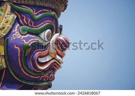 Close-up Giant face in Wat Phra Kaew. Here are the main tourist attractions in Bangkok, Thailand.