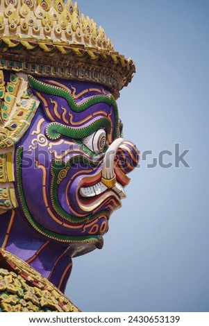 Close-up Giant face in Wat Phra Kaew. Here are the main tourist attractions in Bangkok, Thailand.