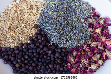 Close-up Of Gin Botanicals In A Bowl Including Rose, Juniper And More.   