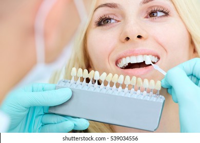 Closeup Of A Girl With Beautiful Smile At The Dentist. Dental