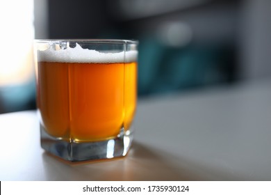 Close-up Of Glass Filled With Light Or Dark Beer. Cold Fresh Drink In Hot Summer Weather. Space For Text Or Advertisement. Copy Space In Right Side. Alcoholic Beverage Concept