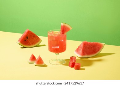 Close-up of a glass filled with watermelon juice and ice on a pastel background. Summer beverage concept. Fresh fruit is good for health. Copy space. - Powered by Shutterstock