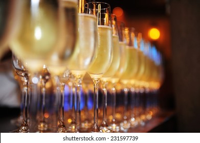 Closeup of glasses of champagne in a row on a table
champagne, celebrate, cheer,  cocktail,  glasses