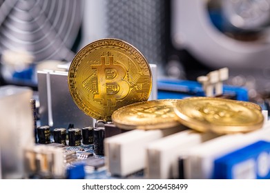 Close-up Of Gold Bitcoin On Computer Components Background, Technology And Digital Currency Concept