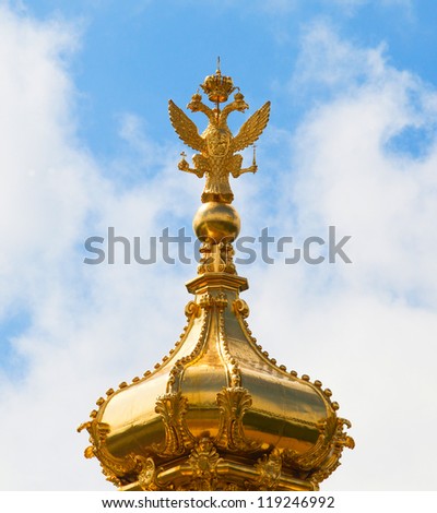Closeup of golden double eagle in Summer Gardens, Peterhof, Russia