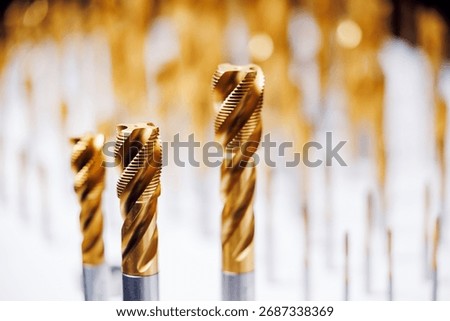 Close-up of golden drill bits for precision cnc machining.