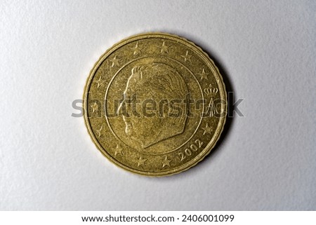 Close-up of golden Euro Cent coin value 50 cents against gray background. Photo taken December 28th, 2023, Zurich, Switzland.