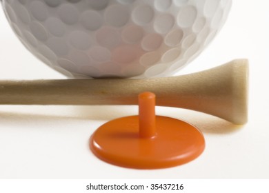 Closeup Of Golf Ball With Tee And Marker