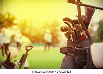 Closeup Of Golf Club In Bag On Golfer Background