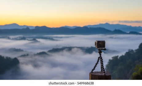 Closeup Of GoPro Hero 4 Camera On  Tripod , The Video Was Filmed In The Morning Fog.