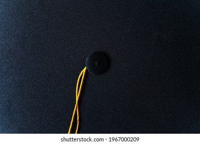 Close-Up Of Graduation Cap On Graduation Gown