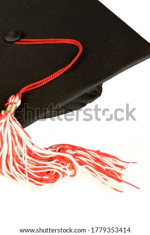 A closeup of a graduation mortar board cap and tassle for educational ceromonies.