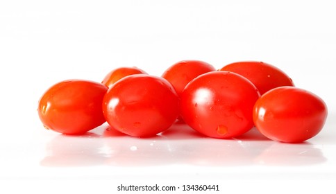 Closeup Of Grape Tomatoes On White Background