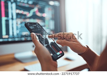 Closeup graph - Woman is checking Bitcoin price chart on digital exchange on smartphone, cryptocurrency future price action prediction.