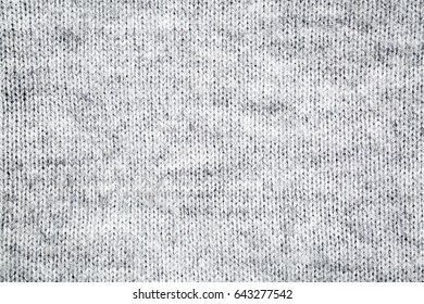 Close-up Of Gray And White Knitted Fuzzy Wool Sweater Texture