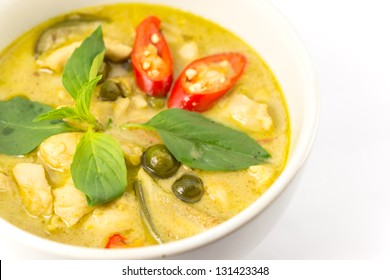 closeup green curry with chicken (Kang Keaw Wan Gai) isolated on white background, Thai local food 