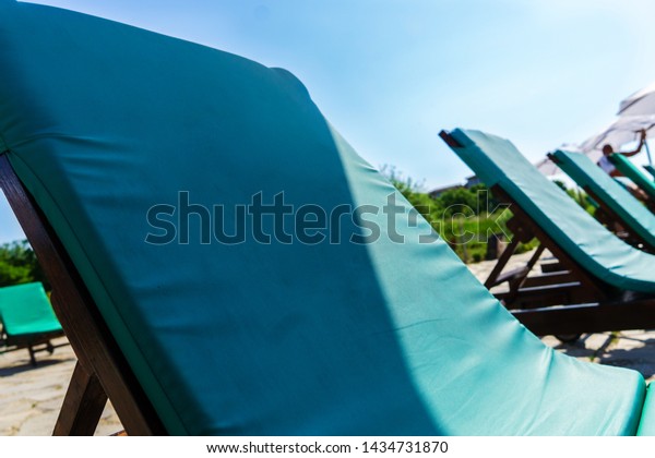 green sun loungers