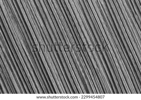 Closeup of the grey pleated textile as background texture