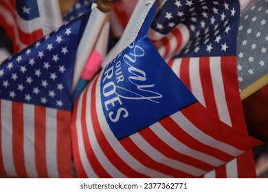 Closeup of a group of American flags - Powered by Shutterstock